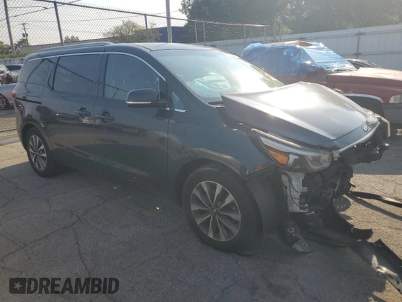 2015 Kia Sedona SX with VIN KNDMC5C10F6047335, listed as a Copart auction lot 66235414 with 154,460 mi miles and Salvage Title. Bid and sale history available at DreamBid. Image 4.
