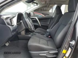 2018 Toyota RAV4 XLE with VIN JTMWFREV1JJ742694, listed as a Copart auction lot 51093695 with 74,502 mi miles and Salvage Title. Bid and sale history available at DreamBid. Image 7.