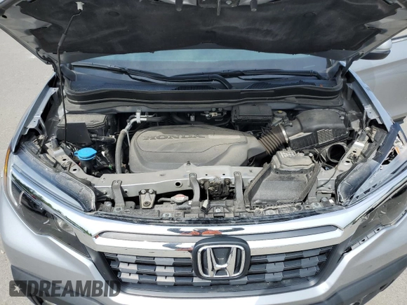 2019 Honda Ridgeline RTL with VIN 5FPYK3F57KB001594, listed as a Copart auction lot 59020335 with 31,465 mi miles and Salvage title. Bid and sale history available at DreamBid. Image 12.