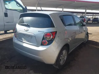2013 Chevrolet Sonic LT with VIN 1G1JC6SH6D4175247, listed as a IAAI auction lot 41658630 with 296,668 mi miles. Bid and sale history available at carsss.com. Image 4.