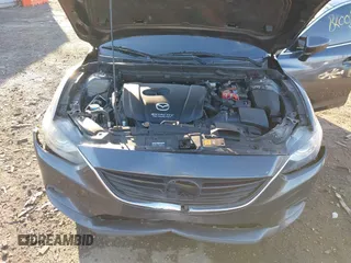 2014 Mazda 6 i Grand Touring with VIN JM1GJ1W50E1107877, listed as a IAAI auction lot 41857596 with 166,188 mi miles and . Bid and sale history available at DreamBid. Image 10.