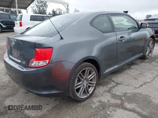 2013 Scion tC with VIN JTKJF5C76D3063500, listed as a IAAI auction lot 41916403 with 146,818 mi miles. Bid and sale history available at carsss.com. Image 4.