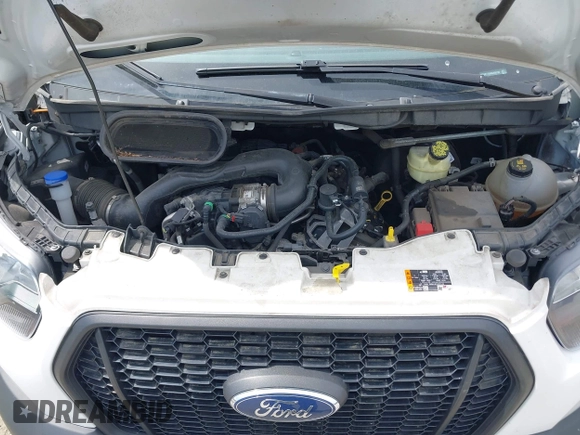 2021 Ford Transit Cargo z VIN 1FTBR1Y89MKA66720, wystawiony jako IAAI lot #42064777 z przebiegiem 112 171 mil mil oraz . Historia ofert i sprzedaży dostępna na DreamBid. Obrazek 10.