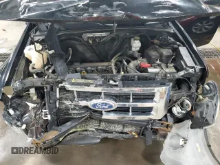 2012 Ford Escape XLT z VIN 1FMCU9D74CKB91598, wystawiony jako Copart lot #51667805 z przebiegiem 182 152 mil mil oraz Szkoda całkowita • Salvage title. Historia ofert i sprzedaży dostępna na DreamBid. Obrazek 13.
