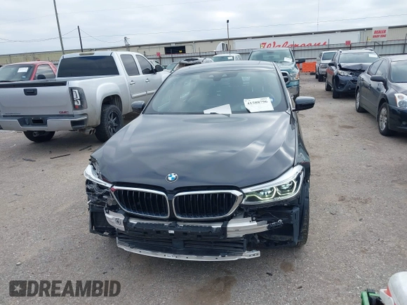 2019 BMW 6 Series 640i xDrive with VIN WBAJV6C50KBK08934, listed as a IAAI auction lot 41588796 with 61,411 mi miles and . Bid and sale history available at carsss.com. Image 12.