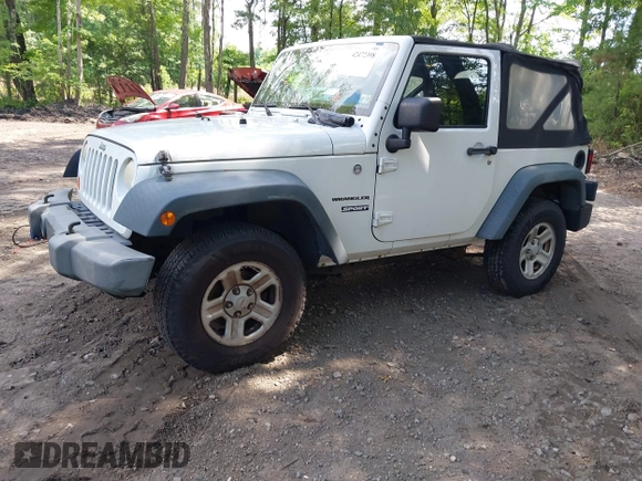 2012 Jeep Wrangler Sport with VIN 1C4AJWAG7CL192200, listed as a IAAI auction lot 42472398 with 198,999 mi miles and . Bid and sale history available at DreamBid. Image 17.
