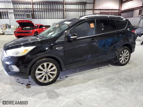 2017 Ford Escape Titanium with VIN 1FMCU0JD8HUC68085, listed as a Copart auction lot 70457844 with NaN miles and Clean Title. Bid and sale history available at carsss.com. Image 1.