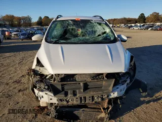 2018 Ford Escape SE z VIN 1FMCU9GD3JUB16376, wystawiony jako Copart lot #83453484 z przebiegiem 163 251 mil mil oraz Szkody całkowita. Historia ofert i sprzedaży dostępna na DreamBid. Obrazek 5.