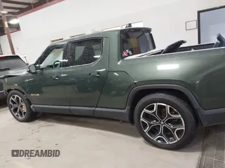 2022 Rivian R1T Adventure Package with VIN 7FCTGAAA0NN004365, listed as a IAAI auction lot 41534730 with 1 mi miles. Bid and sale history available at carsss.com. Image 14.