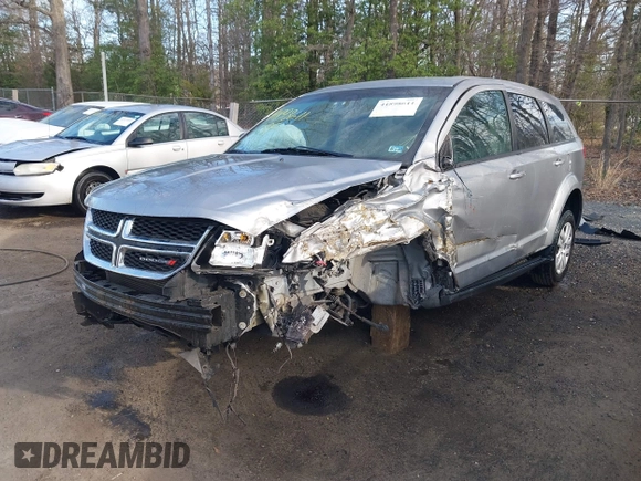 2015 Dodge Journey SE z VIN 3C4PDCAB3FT641675, wystawiony jako IAAI lot #41898611 z przebiegiem 218 121 mil mil oraz . Historia ofert i sprzedaży dostępna na DreamBid. Obrazek 18.
