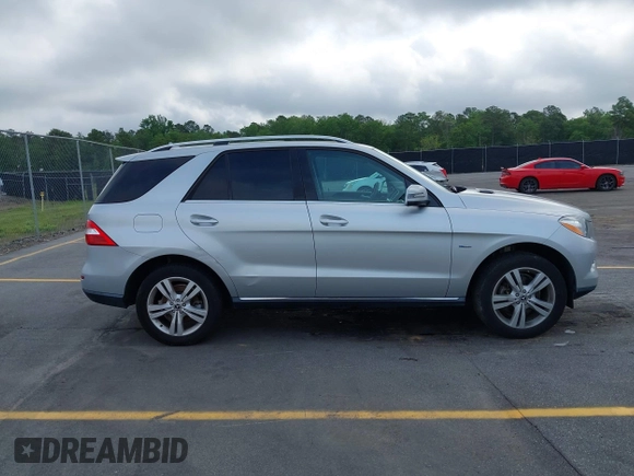 2012 Mercedes-Benz M ML 350 with VIN 4JGDA5HB5CA012821, listed as a IAAI auction lot 42128070 with 94,749 mi miles. Bid and sale history available at carsss.com. Image 13.