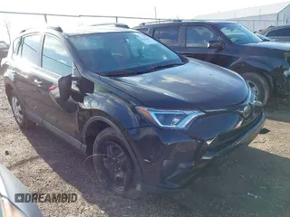 2018 Toyota RAV4 LE with VIN 2T3BFREV8JW706999, listed as a IAAI auction lot 41863485 with 115,589 mi miles. Bid and sale history available at carsss.com. Image 1.