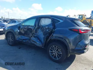 2023 Lexus NX 250 z VIN 2T2ADCAZXPC003877, wystawiony jako IAAI lot #41593097 z przebiegiem 14 597 mil mil oraz . Historia ofert i sprzedaży dostępna na DreamBid. Obrazek 14.