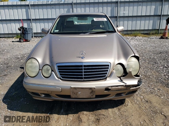 2000 Mercedes-Benz E-Class with VIN WDBJF65J2YB165568, listed as a Copart auction lot 70003994 with 146,518 mi miles and Salvage Title. Bid and sale history available at carsss.com. Image 5.