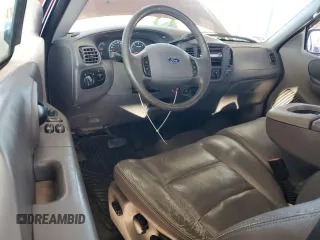 2003 Ford F-150 XL with VIN 1FTRX07L33KB73992, listed as a Copart auction lot 79565774 with 160,545 mi miles and Salvage title. Bid and sale history available at DreamBid. Image 8.