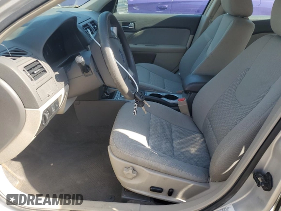 2012 Ford Fusion SE with VIN 3FAHP0HGXCR331498, listed as a Copart auction lot 61859325 with 61,445 mi miles and Salvage title. Bid and sale history available at DreamBid. Image 7.