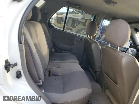 2003 Isuzu Rodeo with VIN 4S2DM58W034303129, listed as a Copart auction lot 83757734 with 114,274 mi miles and Salvage Title. Bid and sale history available at DreamBid. Image 11.