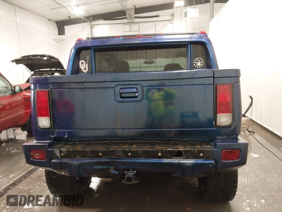 2006 Hummer H2 z VIN 5GRGN22U06H103603, wystawiony jako IAAI lot #41992767 z przebiegiem 165 782 mil mil oraz . Historia ofert i sprzedaży dostępna na DreamBid. Obrazek 17.