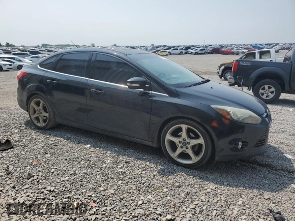 2014 Ford Focus Titanium with VIN 1FADP3J20EL347435, listed as a Copart auction lot 54947345 with 144,169 mi miles and Salvage title. Bid and sale history available at DreamBid. Image 4.