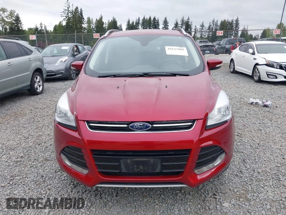 2014 Ford Escape Titanium with VIN 1FMCU9J9XEUD71715, listed as a IAAI auction lot 42127982 with 96,549 mi miles and . Bid and sale history available at DreamBid. Image 12.