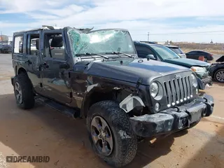 2016 Jeep Wrangler Unlimited Sahara with VIN 1C4BJWEG2GL240061, listed as a IAAI auction lot 41714328 with 107,634 mi miles. Bid and sale history available at carsss.com. Image 1.