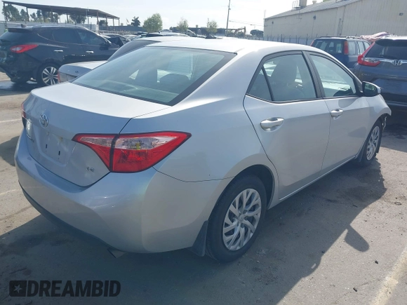 2019 Toyota Corolla L with VIN 2T1BURHE2KC190975, listed as a IAAI auction lot 41901370 with 94,925 mi miles. Bid and sale history available at carsss.com. Image 4.