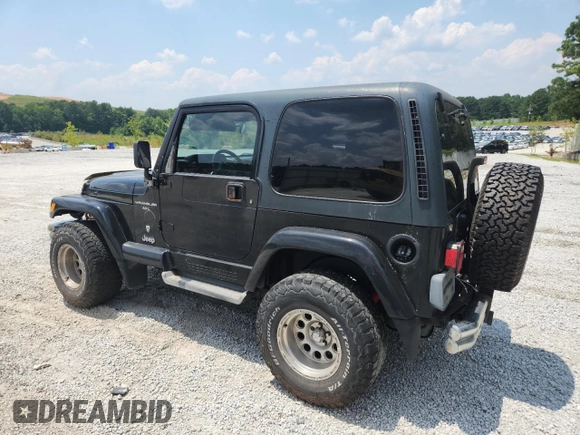 2001 Jeep Wrangler Sport с VIN 1J4FA49S91P347090, выставлен на аукционе Copart как лот 60436405 с пробегом 141 172 миль миль и Списание • Salvage title. История ставок и продаж доступна на DreamBid. Изображение 2.
