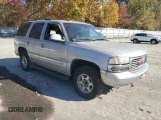2004 GMC Yukon SLE with VIN 1GKEK13T74J249122, listed as a Copart auction lot 77323354 with 0 mi miles and Clean Title. Bid and sale history available at carsss.com. Image 4.