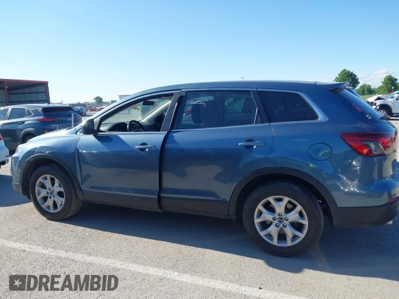 2015 Mazda CX-9 Sport z VIN JM3TB2BAXF0465720, wystawiony jako IAAI lot #42305436 z przebiegiem 130 543 mil mil oraz . Historia ofert i sprzedaży dostępna na DreamBid. Obrazek 14.