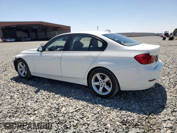 2014 BMW 3 Series 320i with VIN WBA3B1C55EK133687, listed as a Copart auction lot 63049945 with 95,604 mi miles and Salvage title. Bid and sale history available at DreamBid. Image 2.