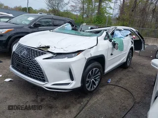 2021 Lexus RX with VIN 2T2HZMDA3MC282824, listed as a IAAI auction lot 42019255 with 1 mi miles. Bid and sale history available at carsss.com. Image 2.