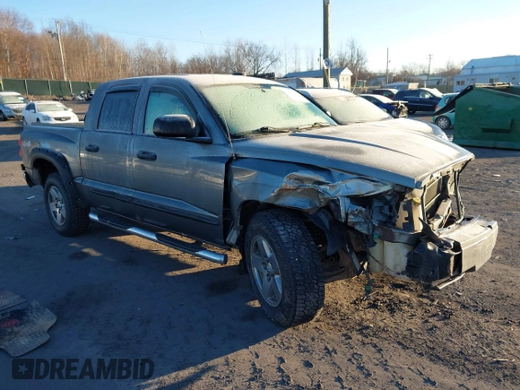 2006 Dodge Dakota SLT with VIN 1D7HW48K56S699157, listed as a IAAI auction lot 41333140 with 273,055 mi miles. Bid and sale history available at carsss.com. Image 1.