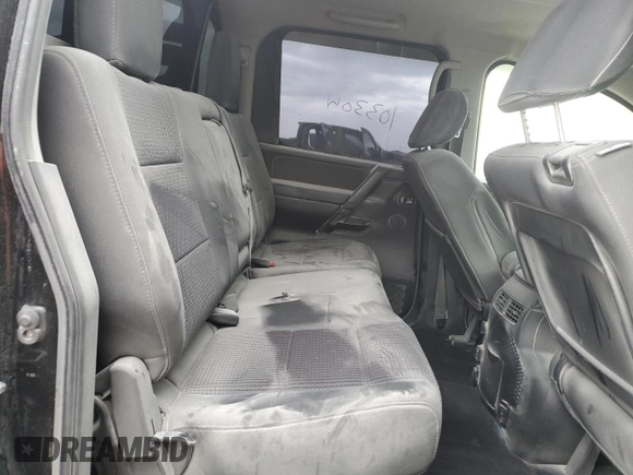 2013 Nissan Titan S with VIN 1N6AA0EC1DN302813, listed as a Copart auction lot 76369234 with 103,304 mi miles and Salvage Title. Bid and sale history available at DreamBid. Image 10.