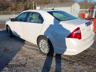 2010 Ford Fusion Hybrid with VIN 3FADP0L34AR287532, listed as a IAAI auction lot 40817732 with 161,351 mi miles. Bid and sale history available at carsss.com. Image 3.