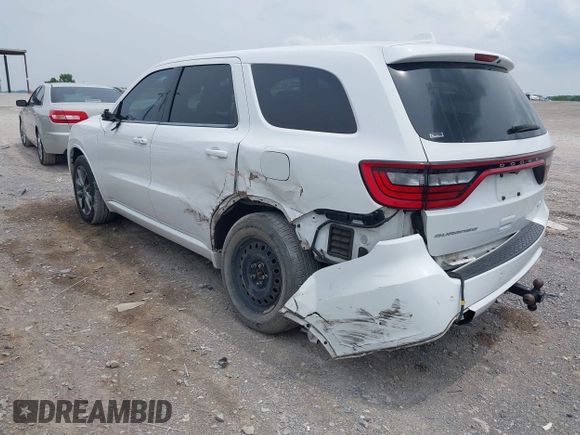2014 Dodge Durango R/T with VIN 1C4SDHCT5EC590056, listed as a IAAI auction lot 42469695 with 174,356 mi miles and . Bid and sale history available at DreamBid. Image 3.