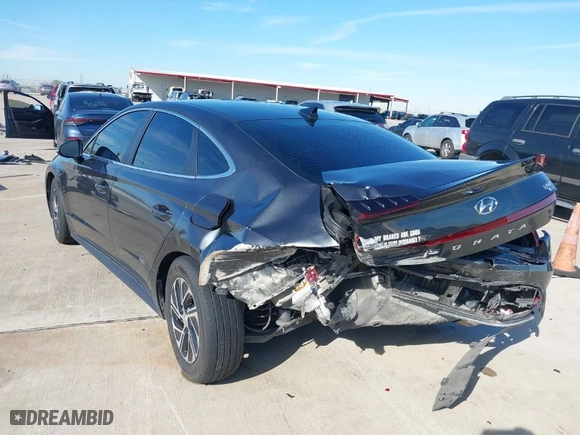 2023 Hyundai Sonata Hybrid Blue with VIN KMHL24JJXPA063693, listed as a IAAI auction lot 41321319 with 57,778 mi miles. Bid and sale history available at carsss.com. Image 3.