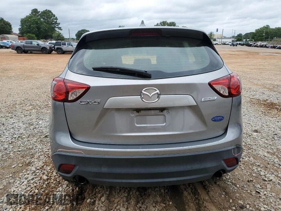 2015 Mazda CX-5 Sport z VIN JM3KE2BE4F0459532, wystawiony jako Copart lot #61049235 z przebiegiem 149 808 mil mil oraz Szkoda całkowita • Salvage title. Historia ofert i sprzedaży dostępna na DreamBid. Obrazek 6.