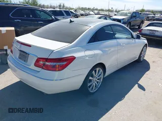 2013 Mercedes-Benz E 350 with VIN WDDKJ5KB1DF220581, listed as a IAAI auction lot 41809947 with 99,775 mi miles and . Bid and sale history available at DreamBid. Image 4.