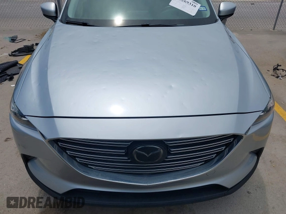 2018 Mazda CX-9 Touring with VIN JM3TCACY5J0219346, listed as a IAAI auction lot 42269310 with 93,989 mi miles and . Bid and sale history available at DreamBid. Image 6.