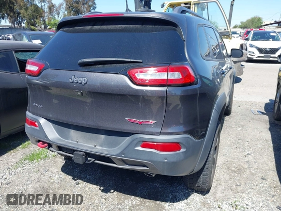 2018 Jeep Cherokee Trailhawk with VIN 1C4PJMBX0JD534722, listed as a IAAI auction lot 41557426 with 109,429 mi miles and . Bid and sale history available at DreamBid. Image 16.