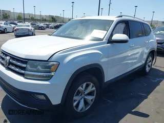 2018 Volkswagen Atlas SE with VIN 1V2DR2CA3JC580575, listed as a IAAI auction lot 41939880 with 66,526 mi miles and . Bid and sale history available at DreamBid. Image 2.