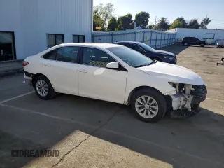 2015 Toyota Camry XLE with VIN 4T4BF1FK8FR487389, listed as a Copart auction lot 53485145 with 42,015 mi miles and Salvage Title. Bid and sale history available at DreamBid. Image 4.