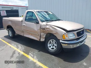 1997 Ford F-150 z VIN 1FTDF17W9VNA84250, wystawiony jako IAAI lot #42149320 z przebiegiem 85 297 mil mil oraz . Historia ofert i sprzedaży dostępna na DreamBid. Obrazek 1.