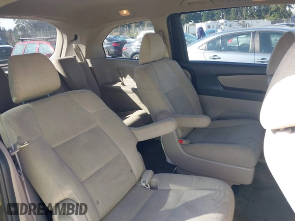 2013 Honda Odyssey LX z VIN 5FNRL5H29DB055166, wystawiony jako IAAI lot #41965037 z przebiegiem 122 470 mil mil oraz . Historia ofert i sprzedaży dostępna na DreamBid. Obrazek 8.