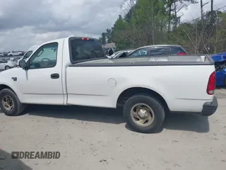2004 Ford F-150 XL with VIN 2FTRF17W24CA02353, listed as a IAAI auction lot 41935141 with 306,280 mi miles and . Bid and sale history available at DreamBid. Image 14.