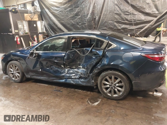 2018 Mazda Mazda6 Sport with VIN JM1GL1UMXJ1330989, listed as a IAAI auction lot 41355353 with 52,869 mi miles. Bid and sale history available at carsss.com. Image 14.