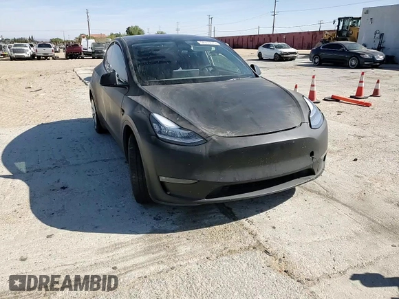 2021 Tesla Model Y Long Range z VIN 5YJYGDEE5MF275302, wystawiony jako Copart lot #54353875 z przebiegiem 63 196 mil mil oraz Szkoda całkowita • Salvage title. Historia ofert i sprzedaży dostępna na DreamBid. Obrazek 13.