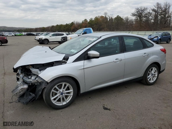 2018 Ford Focus SE with VIN 1FADP3F22JL250739, listed as a Copart auction lot 50523285 with 51,774 mi miles and Salvage Title. Bid and sale history available at carsss.com. Image 1.