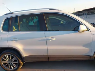 2010 Volkswagen Tiguan SEL with VIN WVGBV7AX4AW514362, listed as a IAAI auction lot 41413300 with 154,201 mi miles and . Bid and sale history available at DreamBid. Image 13.