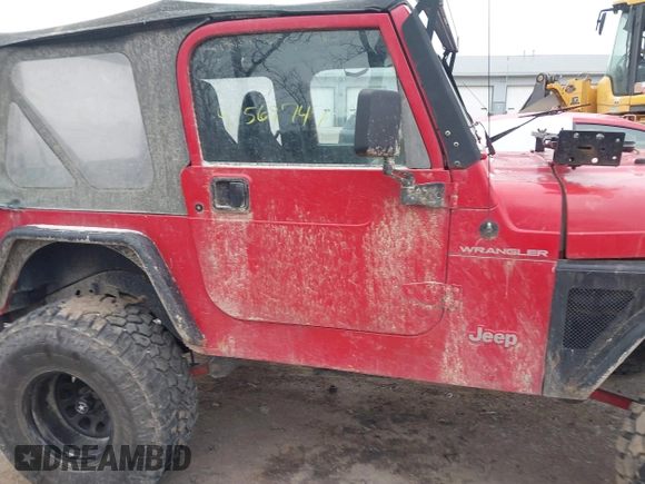 2002 Jeep Wrangler X z VIN 1J4FA39S52P708519, wystawiony jako IAAI lot #41569747 z przebiegiem 219 168 mil mil oraz . Historia ofert i sprzedaży dostępna na DreamBid. Obrazek 13.
